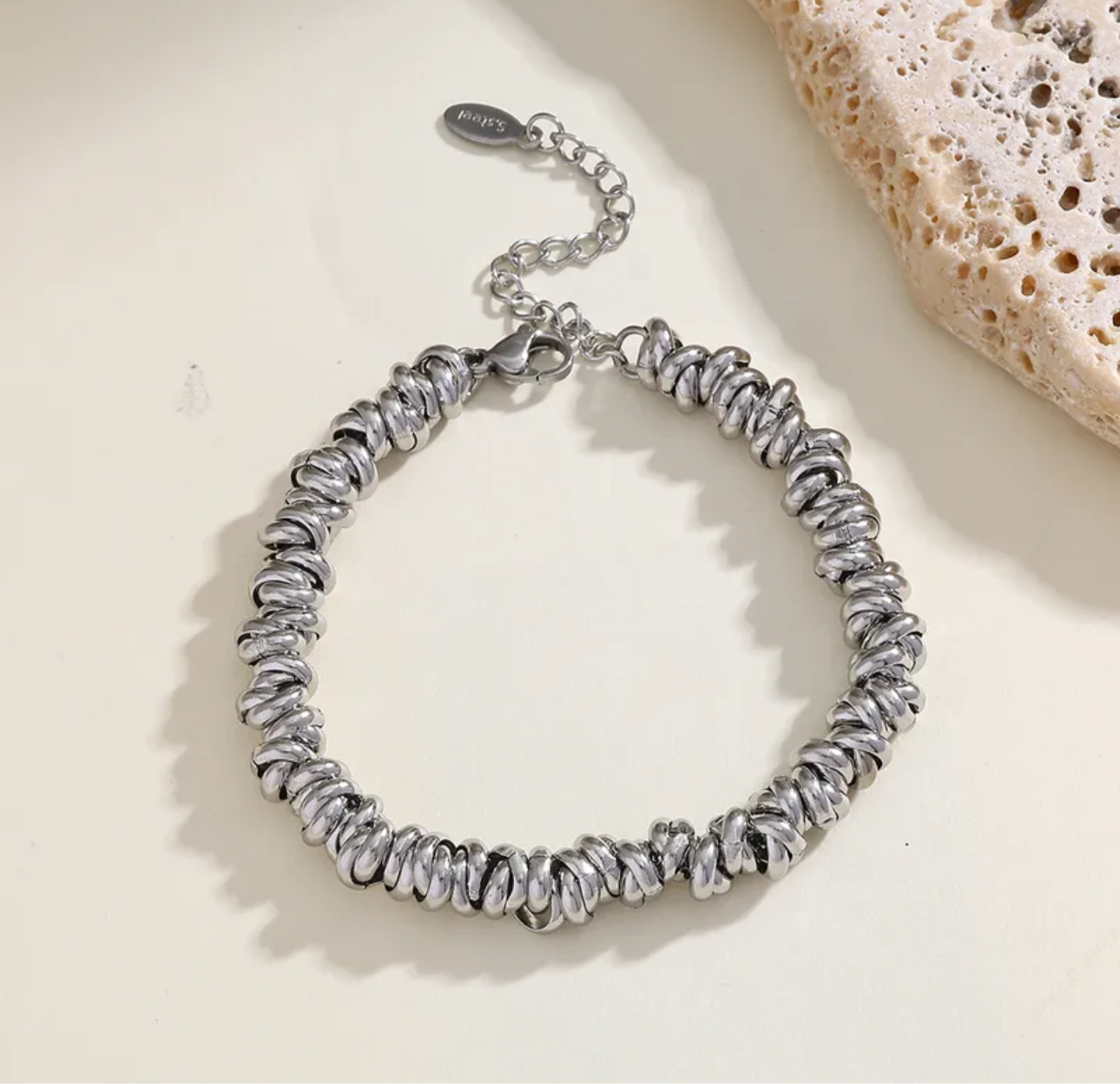Knots of charm
